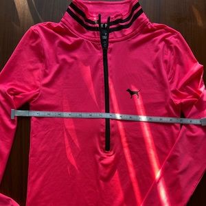 PINK Victoria’s Secret half zip size XS in hot pink.